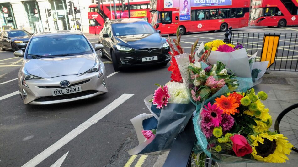LCC protest death flowers at junction