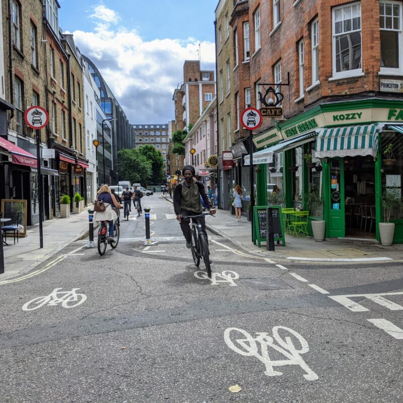 Man cycling through Low Traffic Neighbourhood (LTN)