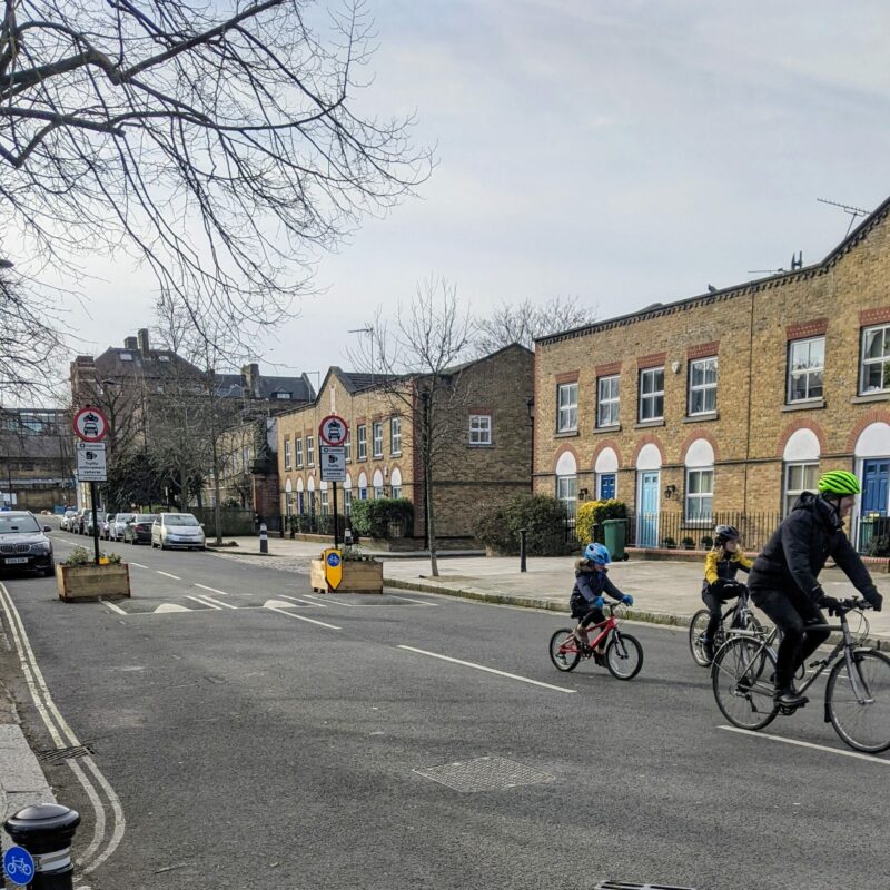 Camden Low Traffic Neighbourhood (LTN) with children and man cycling