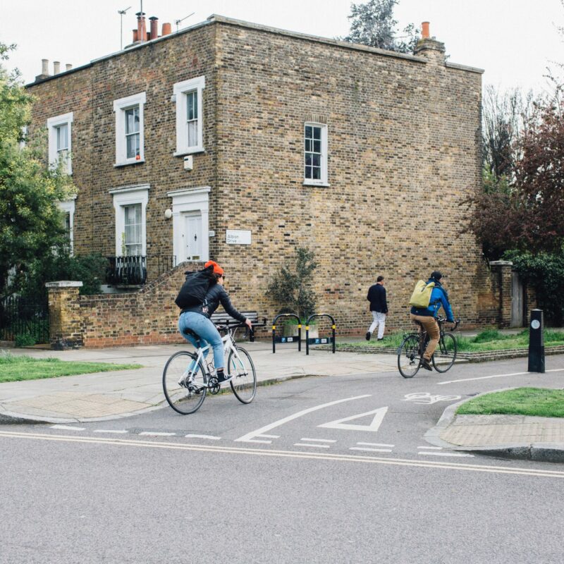 People cycling on quiet cycle lane in Low Traffic Neighbourhood