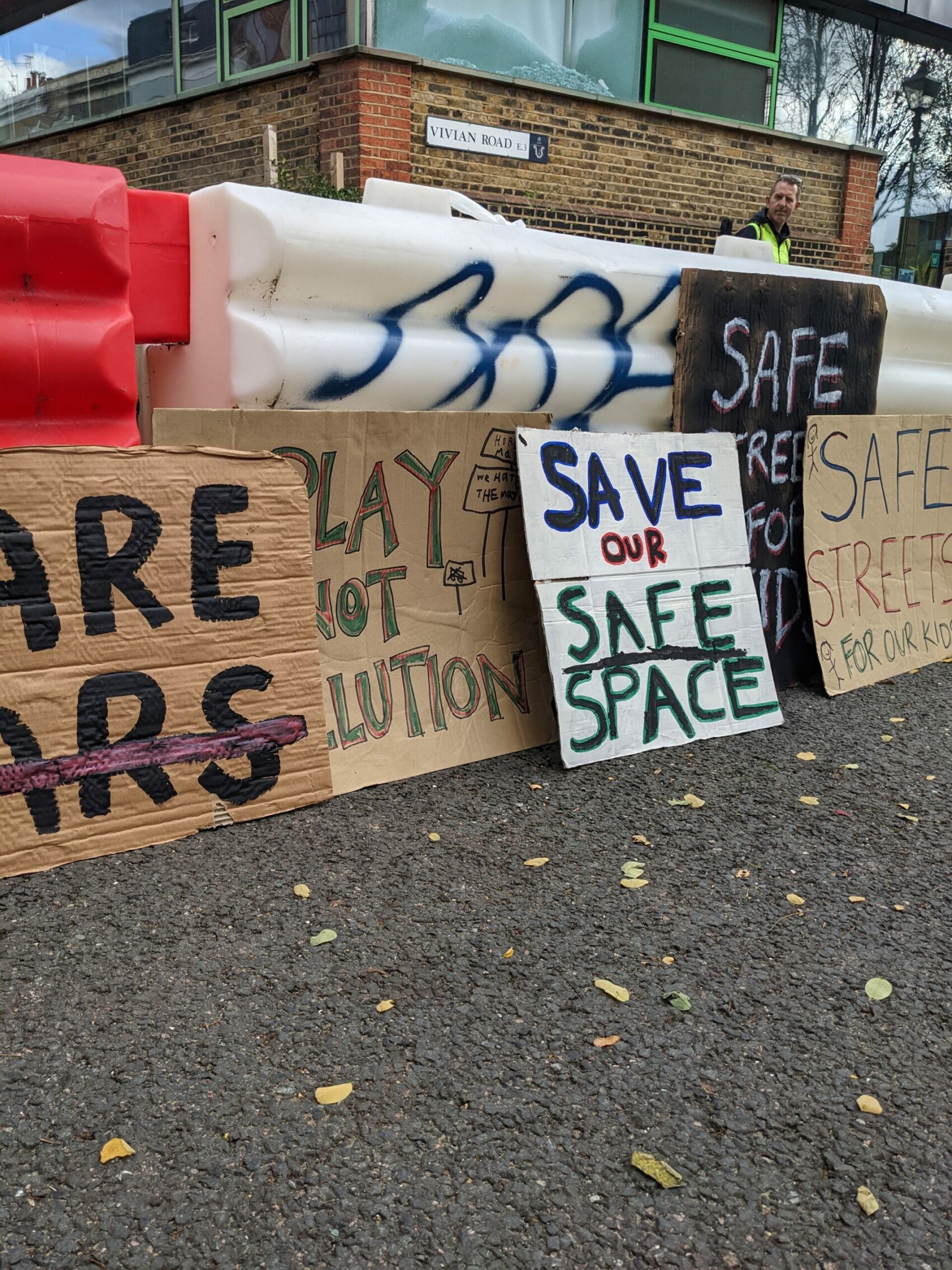 Tower Hamlets child school street protest signs